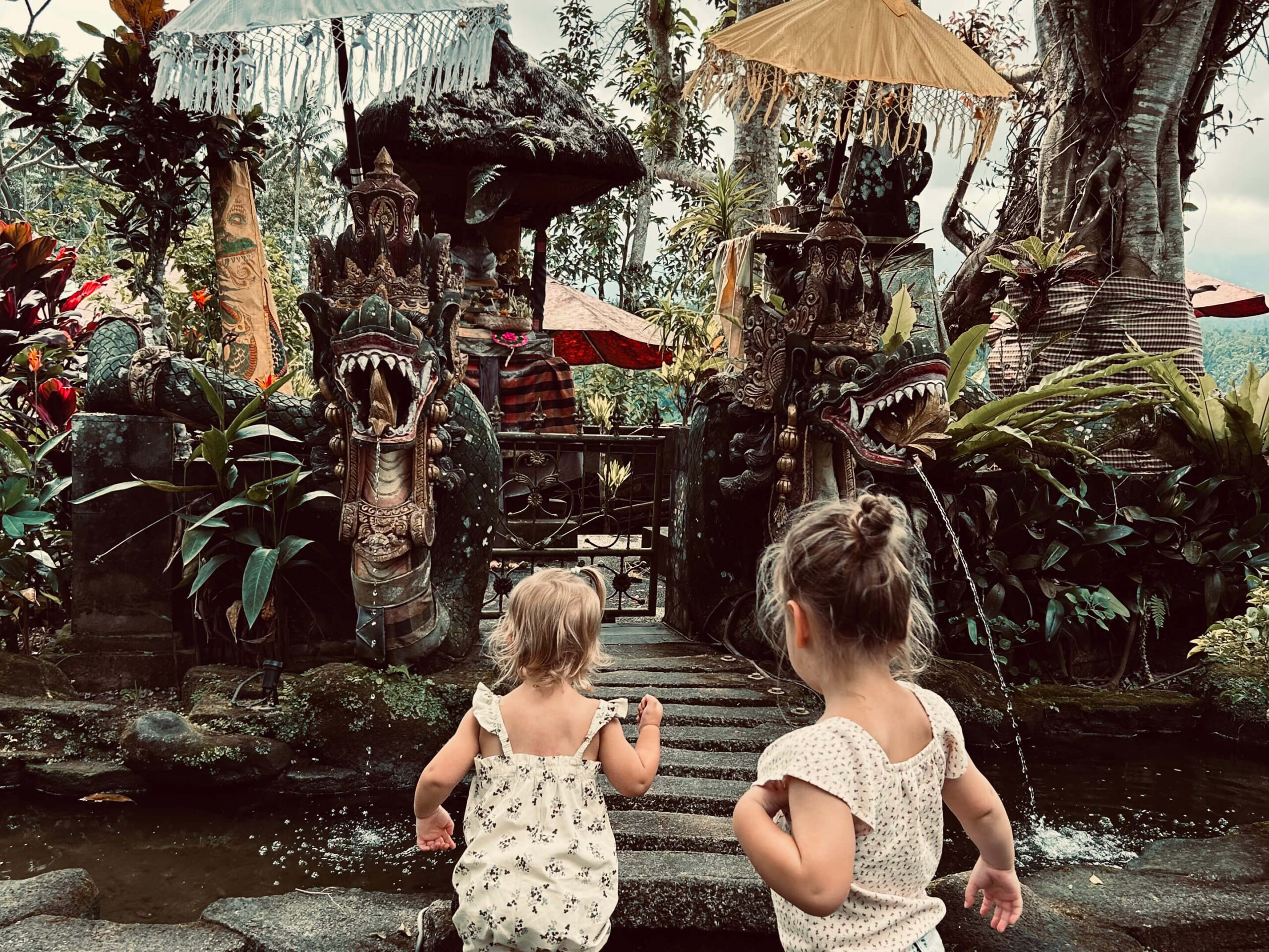 Kids visiting Bali temple while being on family holiday