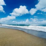 Family enjoying Batu Bolong Beach in Canggu, Bali, a popular area for surf, cafรฉs, and active family holidays