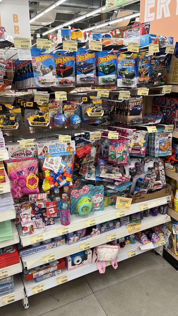 Buying small toys for carry-on to keep kids entertained during a long flight