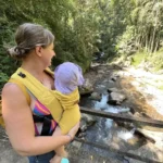 Gitgit waterfall in North Bali with a baby