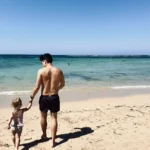 Kids playing on Mengiat beach in South Bali