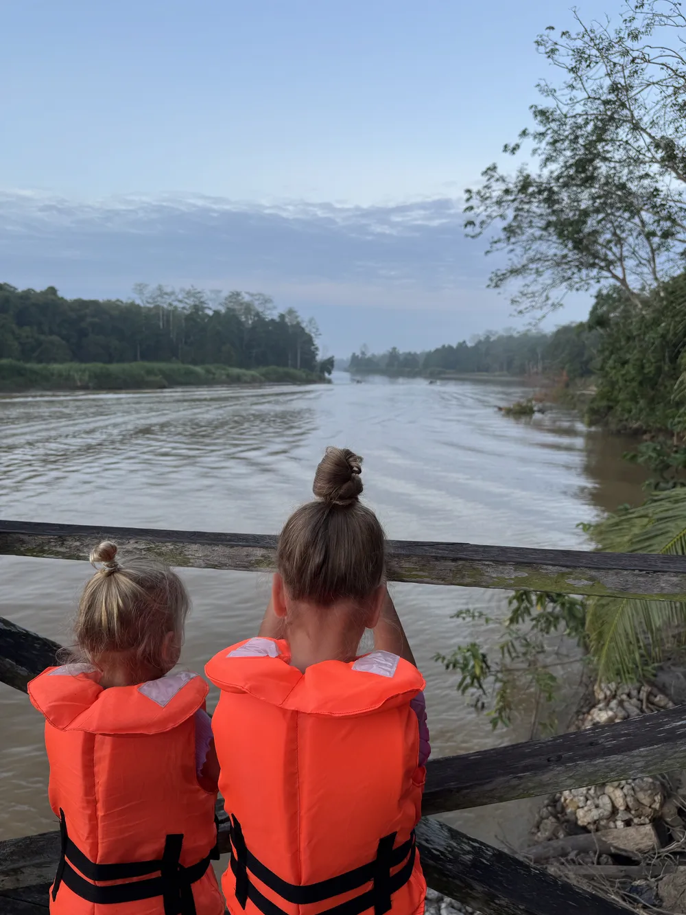 Children wearing life jackets during a Kinabatangan River boat safari