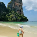 Toddler playing on Railay Beach in Krabi