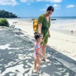 Mother and daughter walking to Kamala Beach Phuket