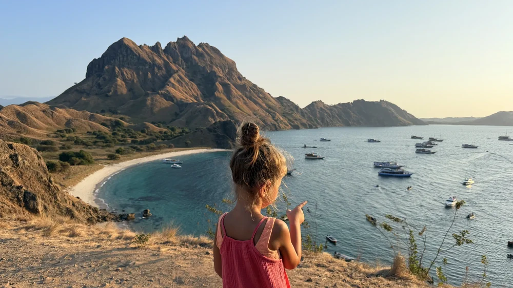 Child hiking to the Padar Island viewpoint in Komodo National Park, Indonesia