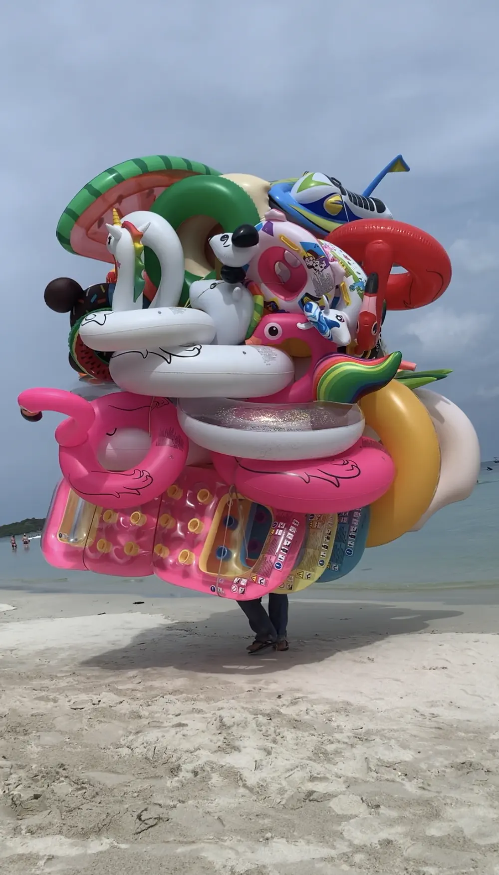 Beach vendor with inflatable toys on Koh Samui beach in Thailand
