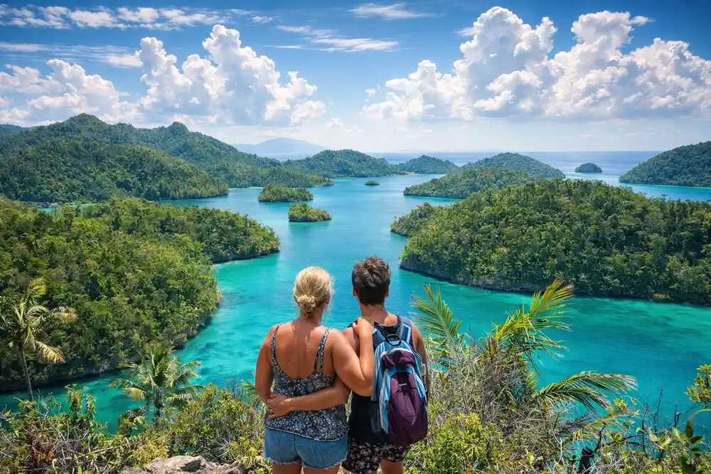Family viewpoint at Wayag islands Raja Ampat Indonesia