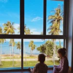 Two sisters in pajamas at a family hotel in Thailand