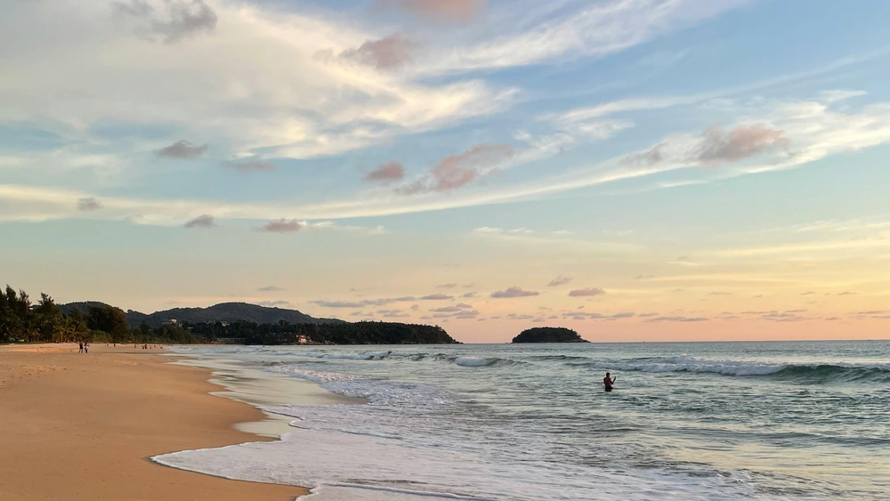 Wide sandy beach on Phuket west coast near Karon Beach Thailand