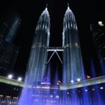 Lake Symphony fountains at KLCC Park in Kuala Lumpur with kids