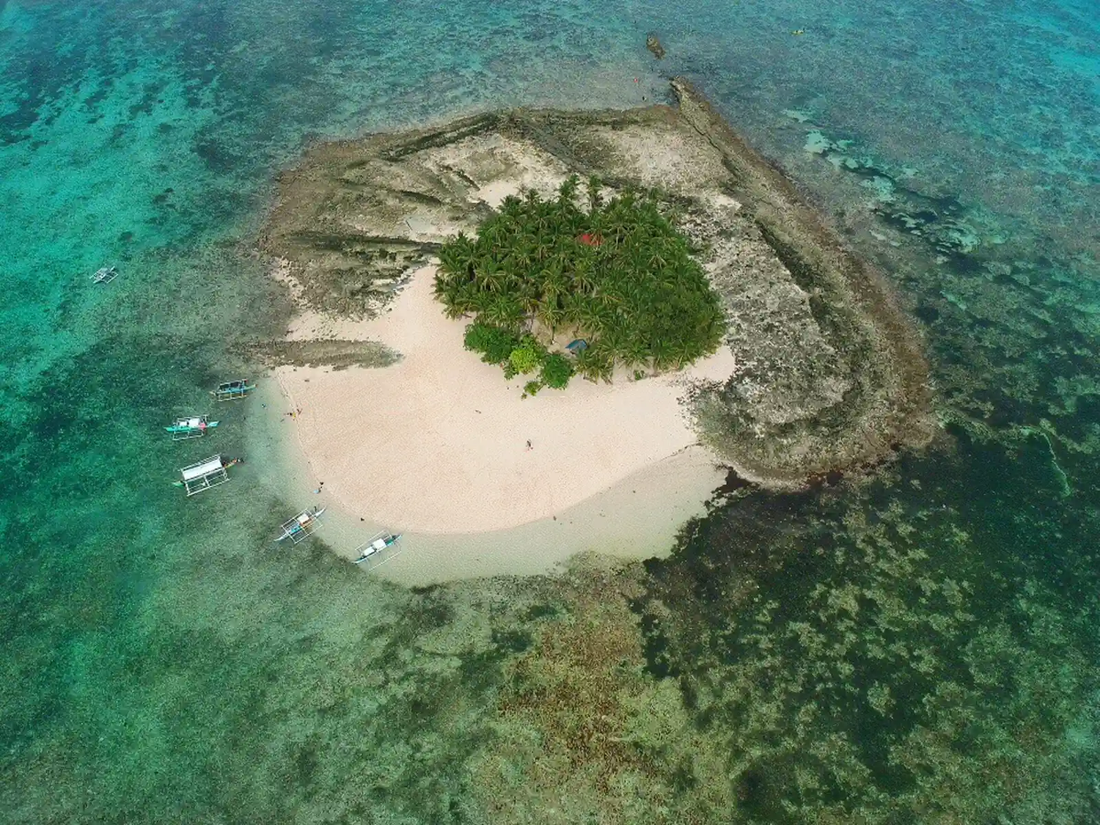 Drone view of an island-hopping tour in Siargao, Philippines