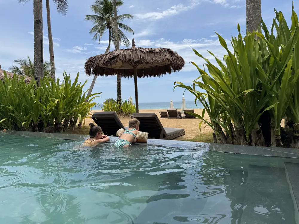 Our daughters at ANGKLA Beach Club & Boutique Resort on Nacpan Beach, El Nido
