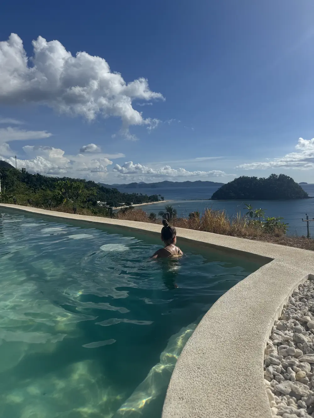 Our daughter swimming in the pool at El Nido Bayview Resort, Palawan