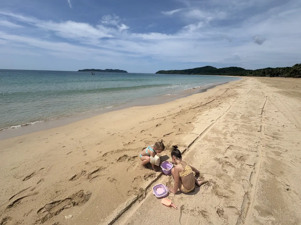 Our children enjoying Nacpan Beach in El Nido