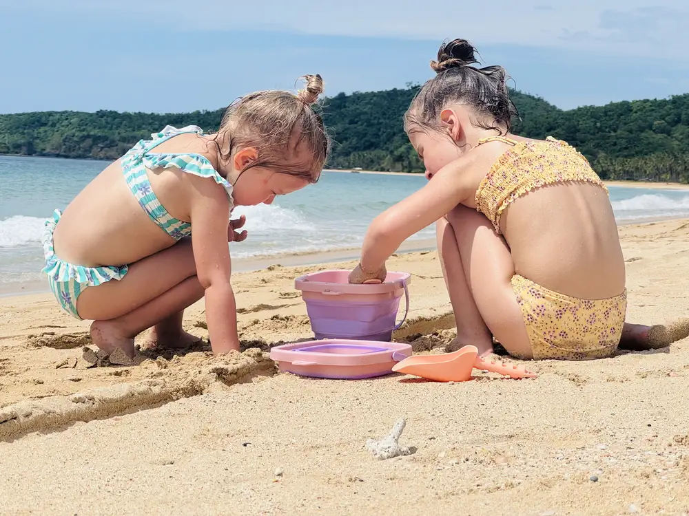 Our daughters playing on Nacpan Beach in El Nido