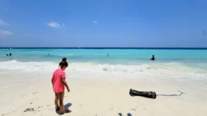 Daughter enjoying Dumaluan Beach in Bohol, Philippines, during a family vacation with kids