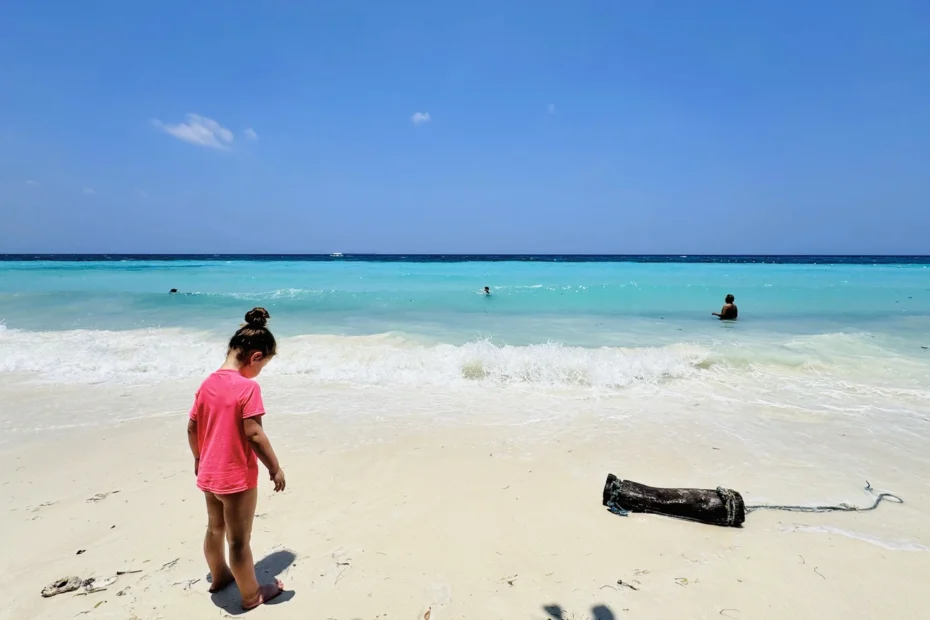 Daughter enjoying Dumaluan Beach in Bohol, Philippines, during a family vacation with kids
