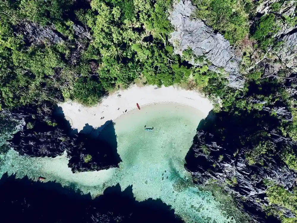 Drone view of Secret Lagoon during an island-hopping tour in El Nido