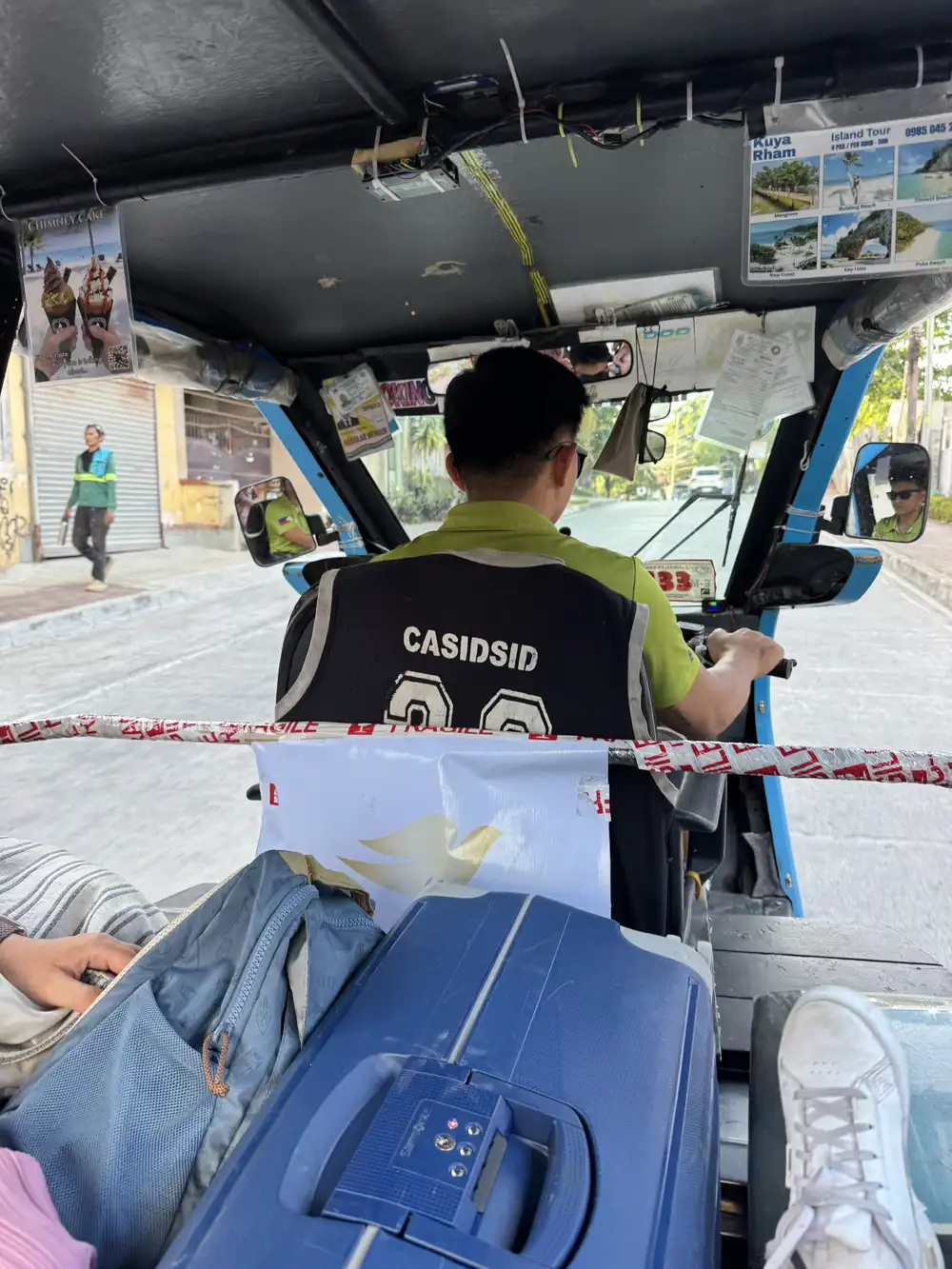Our family exploring El Nido by tricycle