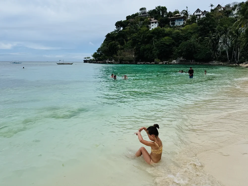 Our daughter playing on Diniwid Beach in Boracay