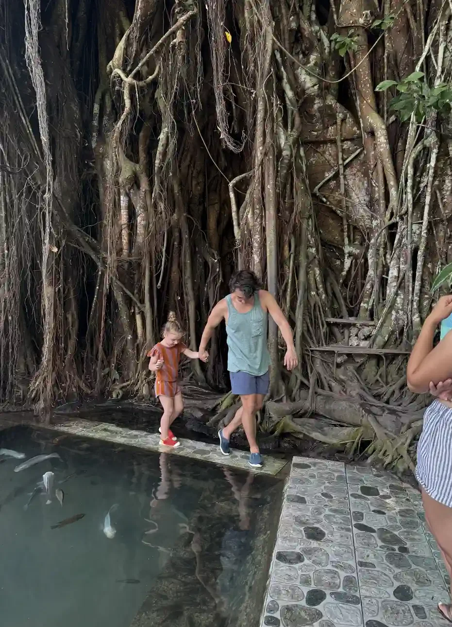 Father and daughter at the Old Enchanted Balete Tree in Siquijor