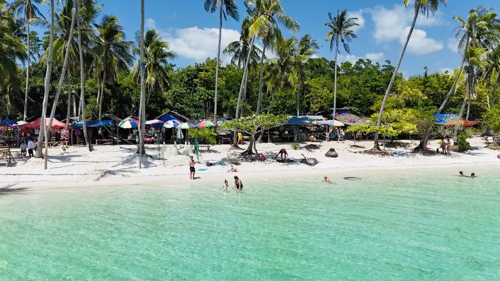 Family at Paliton Beach seen from above in Siquijor