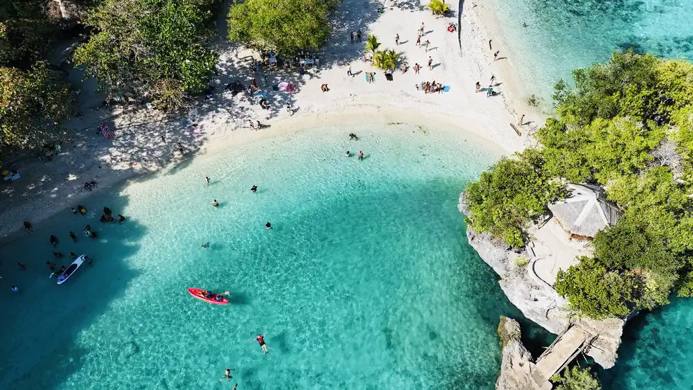 Family at Salagdoong Beach seen from above in Siquijor