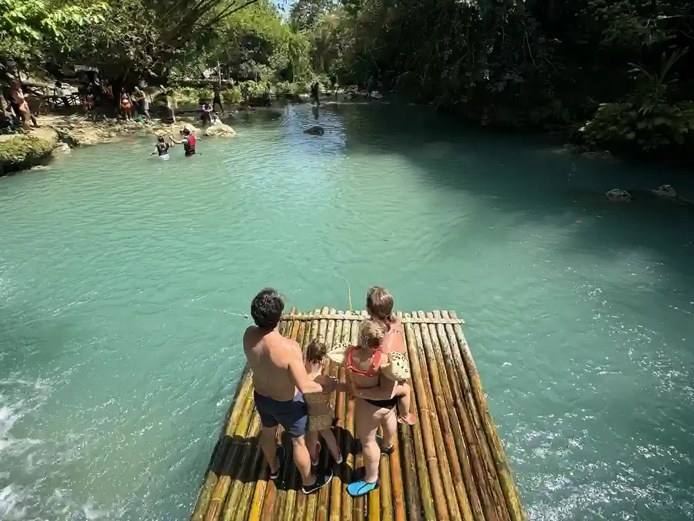 Family enjoying Cambugahay Falls in Siquijor