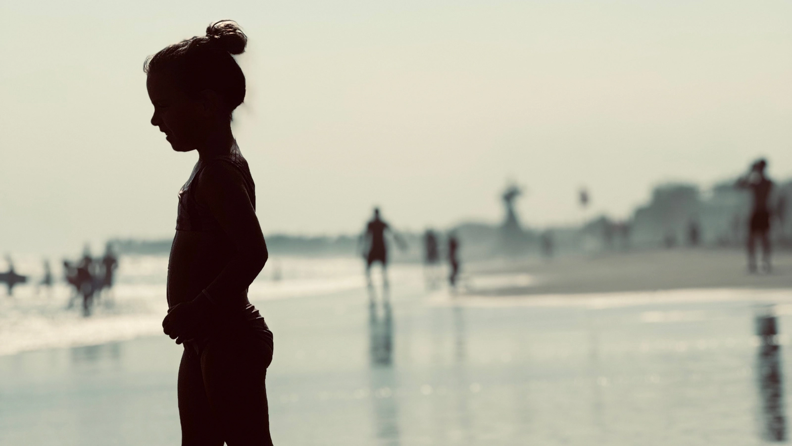 Our daughter playing on Canggu beach