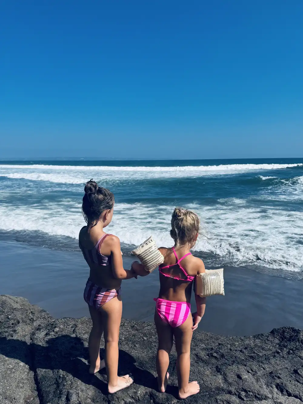 Our daughters on Batu Bolong Beach in Canggu, Bali