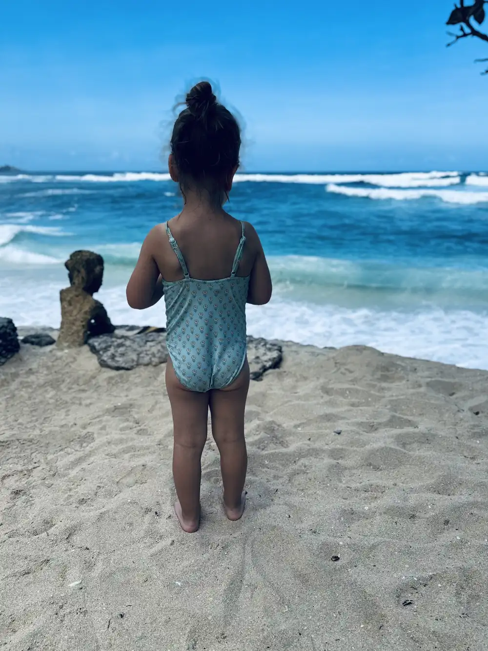 Toddler playing in the sand at Dreambeach Lembongan